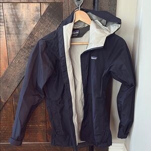 Patagonia Women’s Navy Hooded Raincoat Weather-Resistant Design